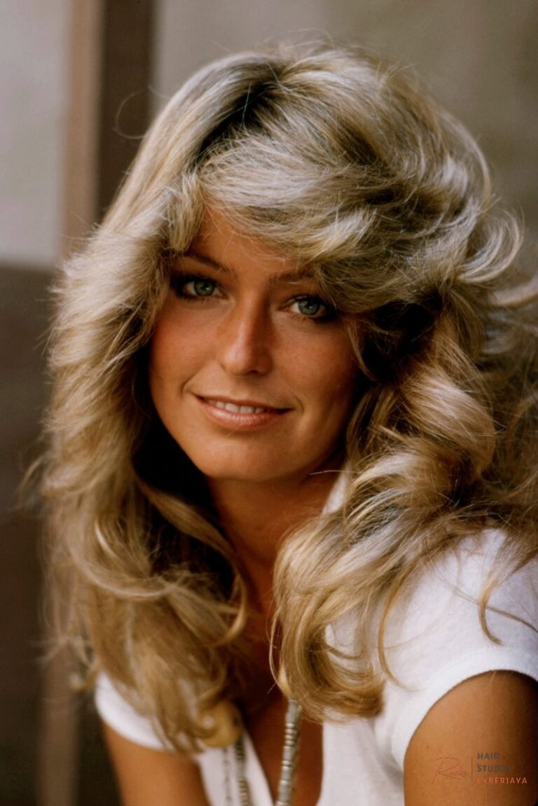 An iconic image of Farrah Fawcett showcasing the feathered flip, a cornerstone of 70s hair fashion.