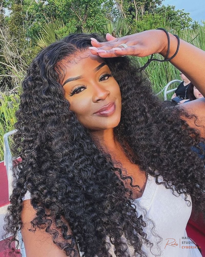 Burmese Curly Hair Bundle Set A set of three Burmese Curly Hair Bundles, showcasing their natural bounce and consistent curl pattern for a cohesive look.