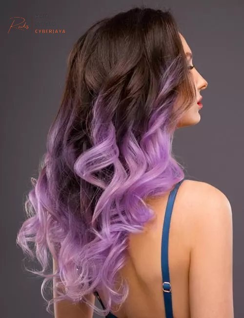 Lavender ombre curls Curly hair with a vibrant lavender ombre color