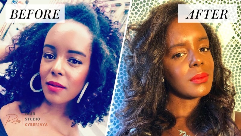 Straightening Kinky Curly Hair Step by Step A person straightening kinky curly hair without chemicals