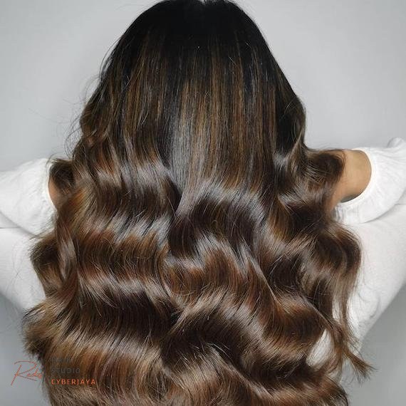 Mocha Brown Hair with Lighter Accents Hair styled with a mocha dark chocolate brown base and lighter accents