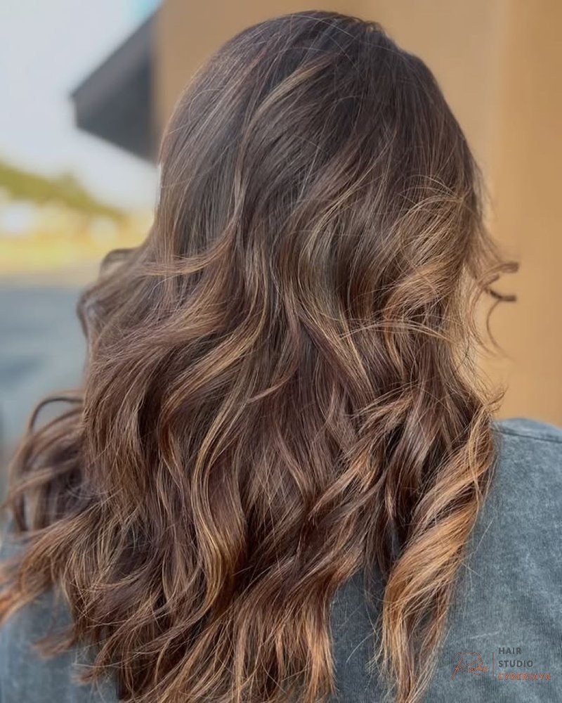 Mocha Mousse Hair Color Inspired Looks Get inspired by Color of the Year 2025: Mocha Mousse, featuring versatile looks for a modern and chic style.