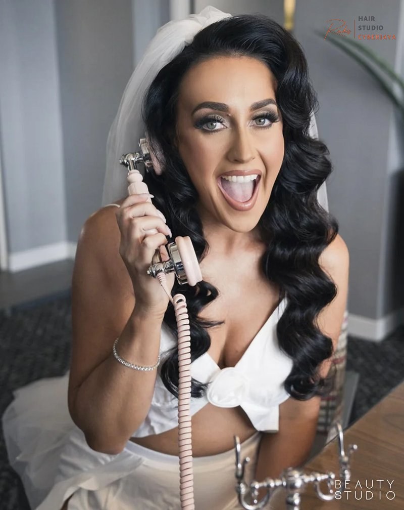 Expert wedding makeup application for your special day A bride having her wedding makeup applied