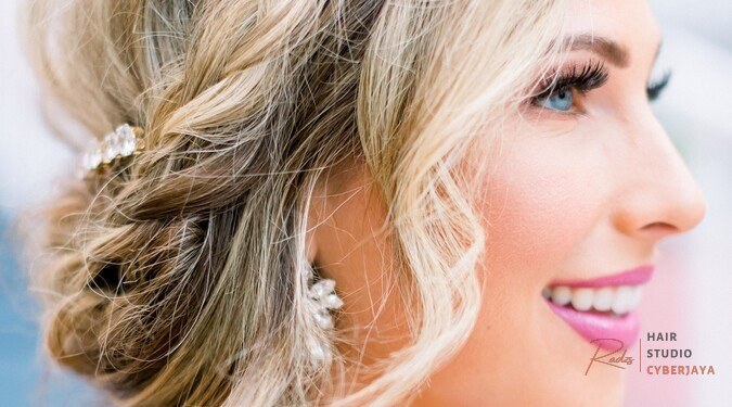 Perfect wedding hair and makeup for a happy bride A smiling bride with perfect wedding hair and makeup